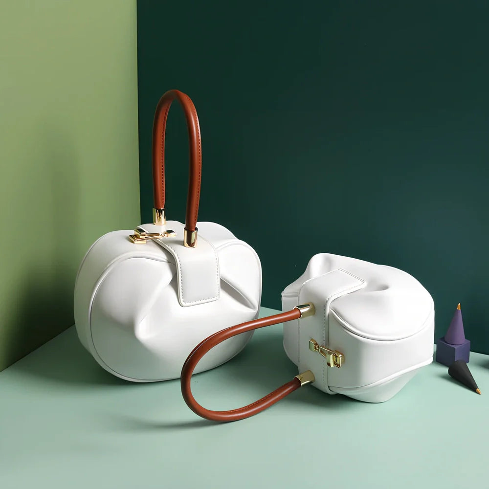 Women's cowhide leather tote bag in tramp shape with single handle and buckle, available in apricot, black, and other colours, big size 35cm x 40cm