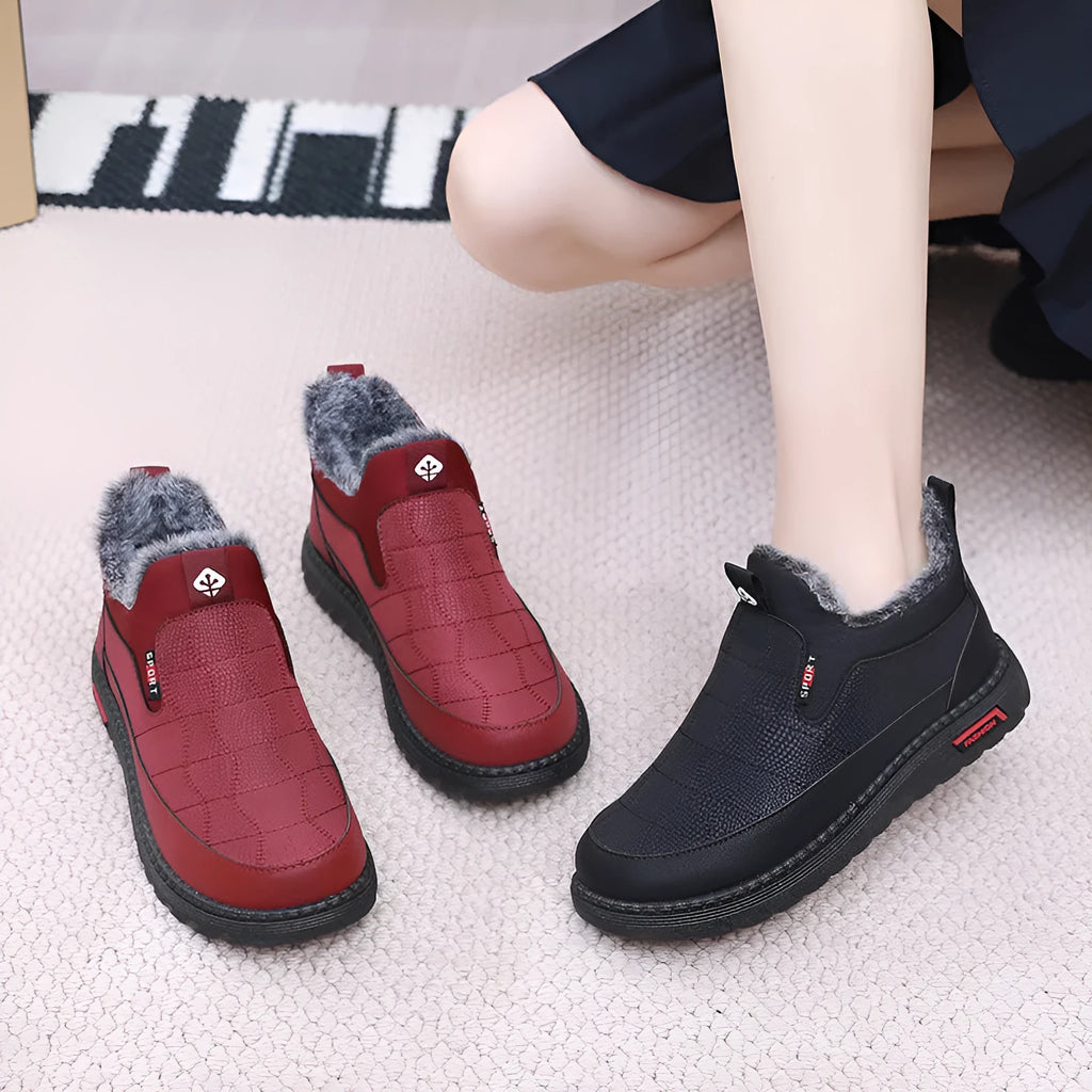 Women's black casual flat boots with round toe and rubber sole