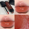 Mirror Lip Lacquer in glossy black finish showing six colour shades from tomato red to sweet potato purple
