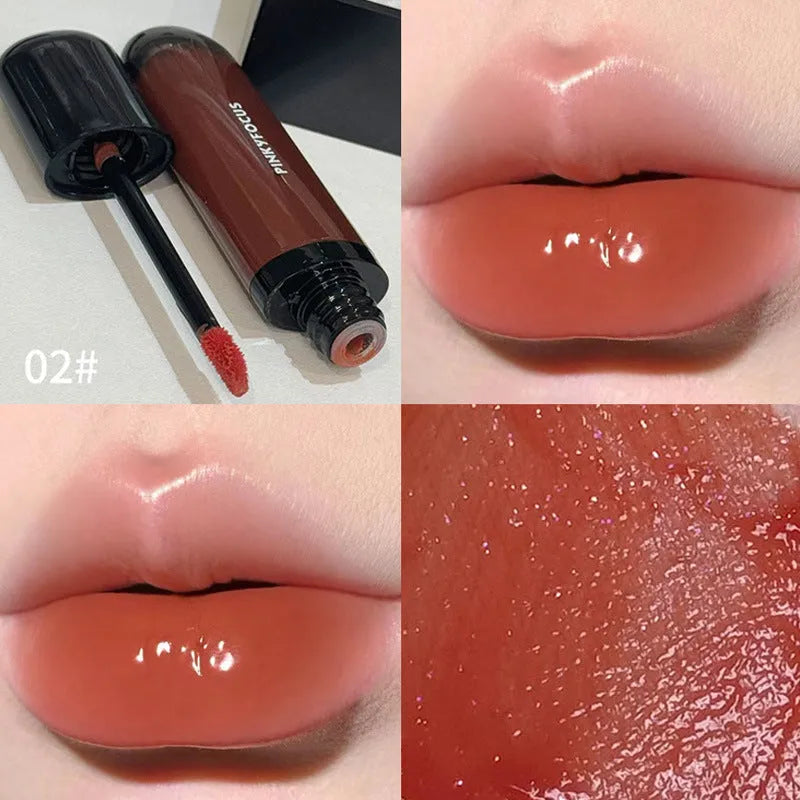 Mirror Lip Lacquer in glossy black finish showing six colour shades from tomato red to sweet potato purple