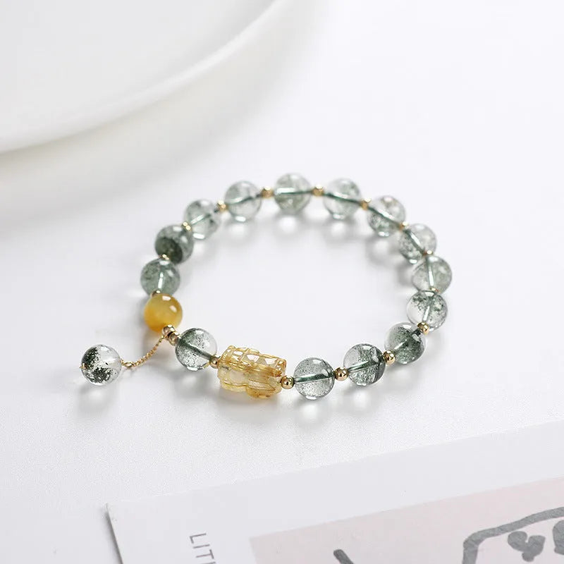 Green Phantom Quartz crystal bracelet with geometric beads and gold accents