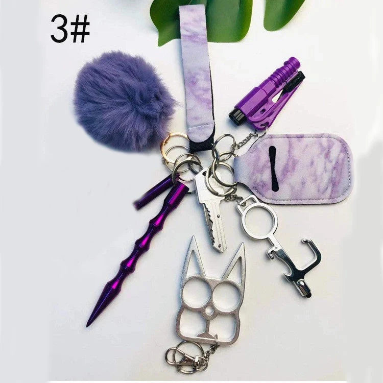 Self-defense keychain set for women with 11 safety tools including alarm, window breaker, and whistle