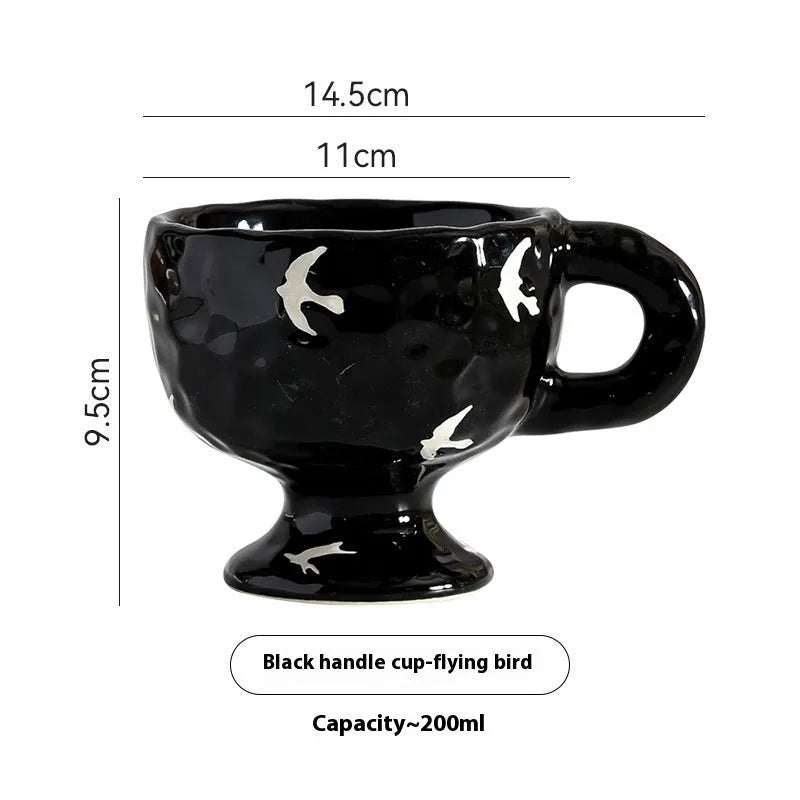 Hand-pinched irregular ceramic mug in a solid colour on a plain background.