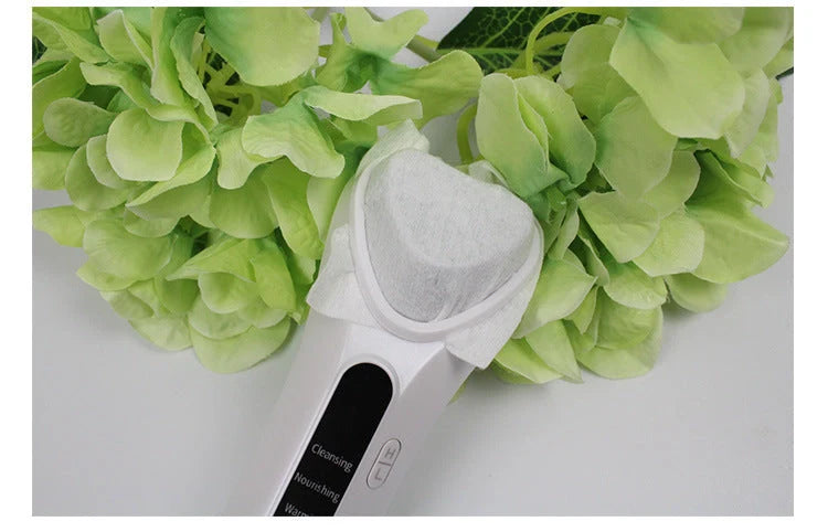 Electric Ultrasonic Facial Beauty Device in white, compact design for skincare