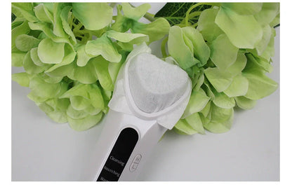 Electric Ultrasonic Facial Beauty Device in white, compact design for skincare