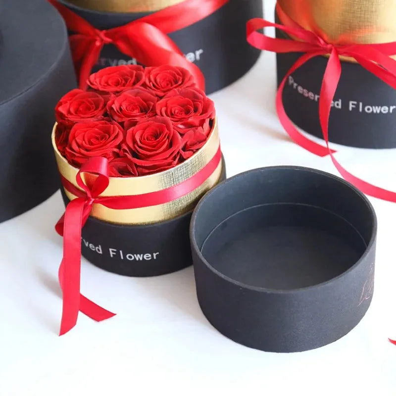 Eternal preserved real roses arranged in a decorative presentation gift box.