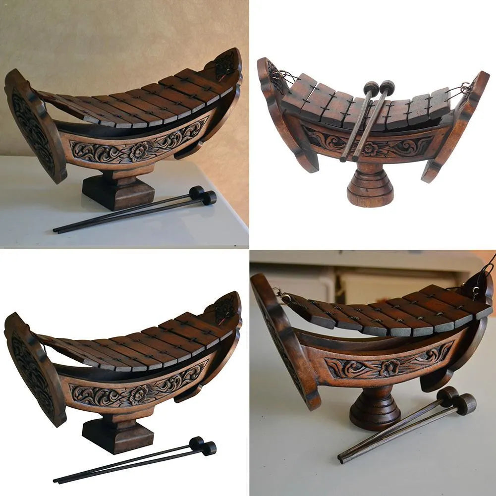 Brown wooden hand xylophone decorative pendant measuring 27x16cm in Southeast Asian style