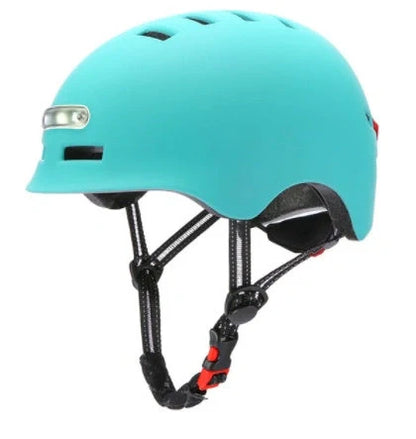 Black cycling helmet with built-in LED headlight and taillight showing adjustable dial and ventilation ports