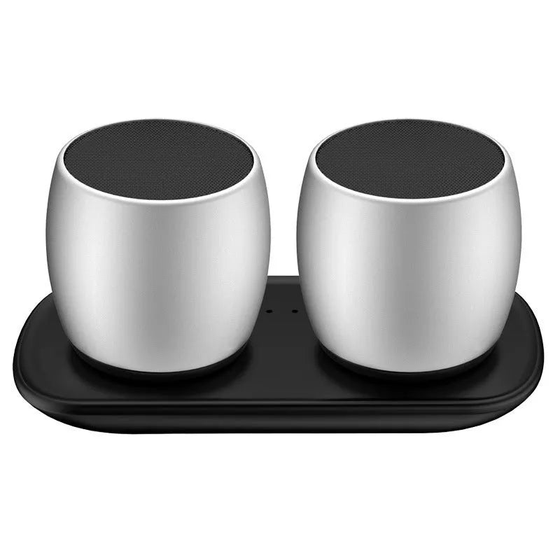 Creative Bluetooth speaker set 1 pair gold colour with magnetic charging base on desk