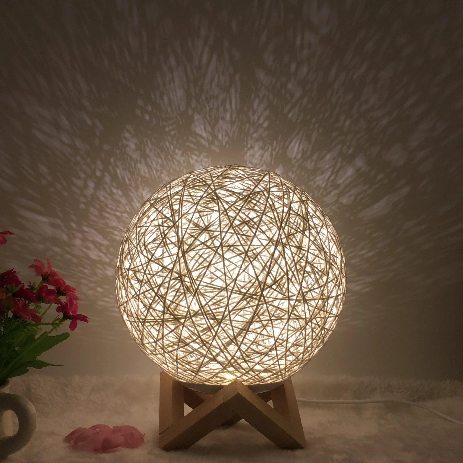 LED rattan table lamp with hand-knit lampshade in various colours