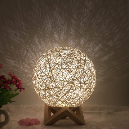 LED rattan table lamp with hand-knit lampshade in various colours
