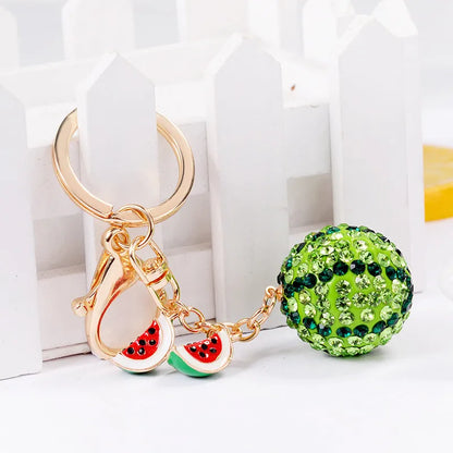 Green watermelon-shaped zinc alloy keychain measuring 12cm in length