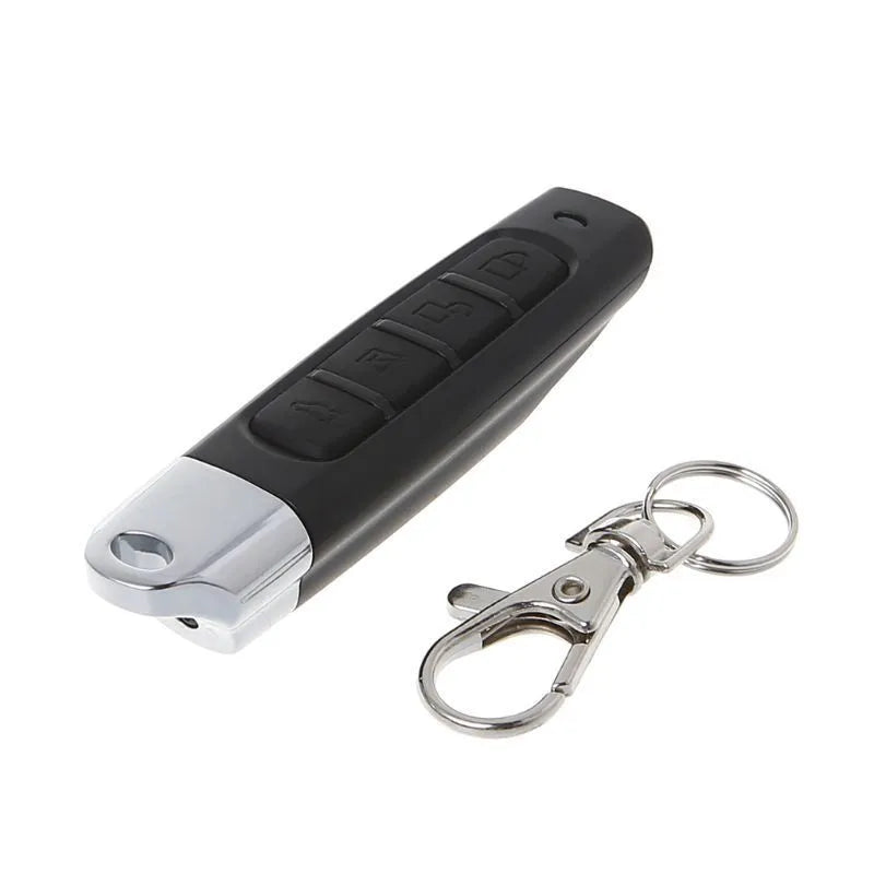 A compact rolling door remote control in black, showing its buttons and slim profile.