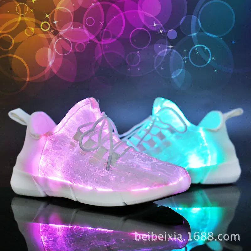 Casual loafers for men and women with fly woven upper, flat heel, and luminous accents in white colour option