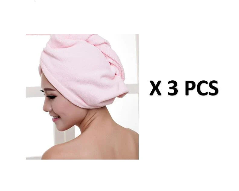 Absorbent microfiber hair turban in various vibrant colours, designed for fast and convenient drying