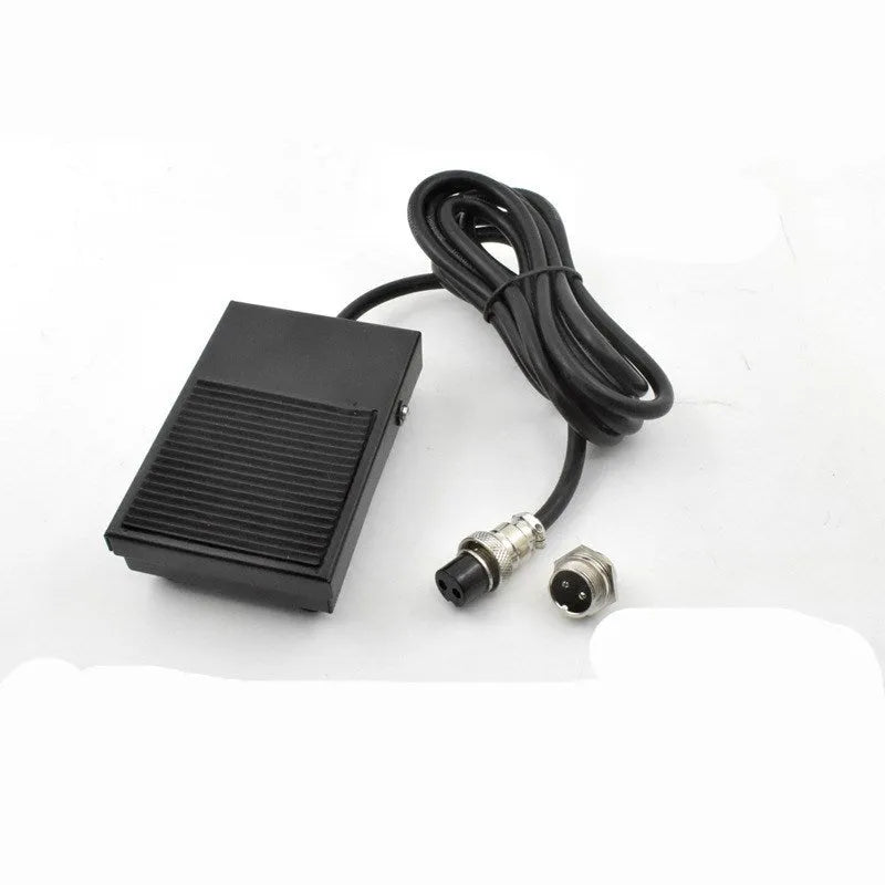 Metal welding foot switch pedal with black rubber top and a 1.8 metre long grey cable attached
