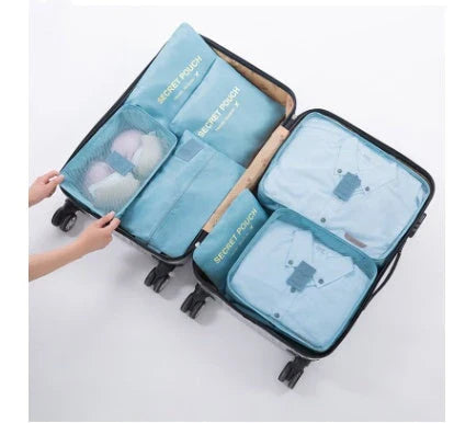 Durable waterproof packing cubes in various colors for organized, efficient travel