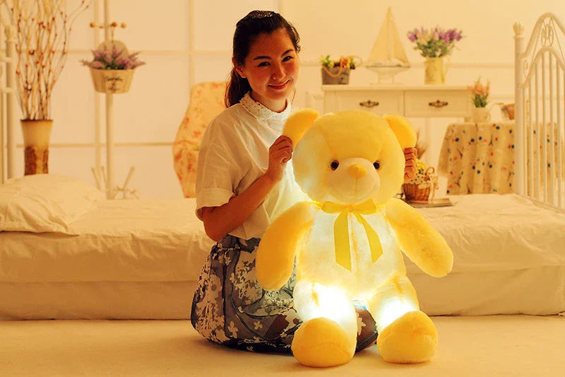 Colorful light-up plush teddy bear with over 7 changing LED colors, a cozy and unique Christmas gift for kids