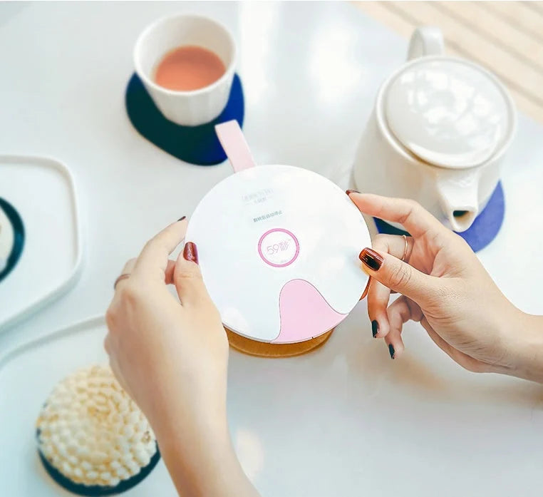 Compact USB baby bottle sterilizer with gravity sensing technology