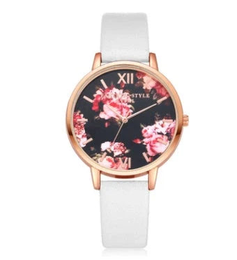 Rose gold women's watch with leather strap and love heart design