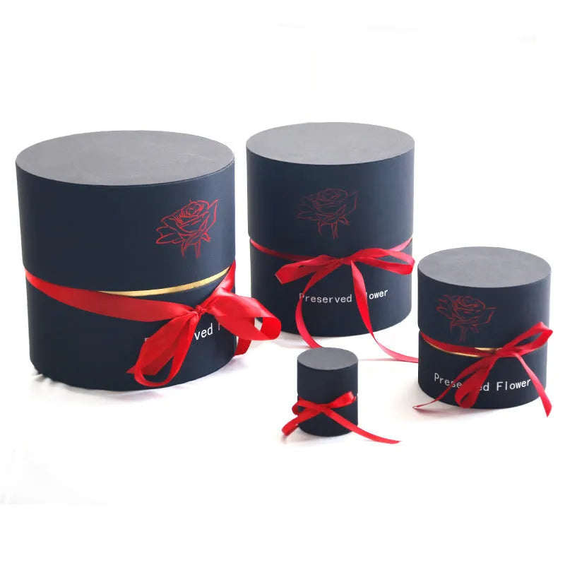 Eternal preserved real roses arranged in a decorative presentation gift box.