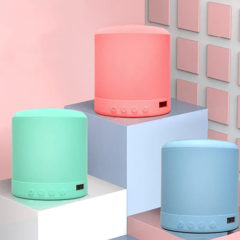 A11 compact wireless subwoofer stereo speaker in black, pink, blue, or green colour options