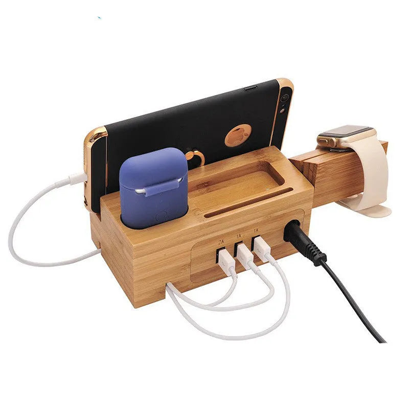 Natural bamboo multifunctional charging dock holding an iPhone, Apple Watch, and AirPods with three USB ports