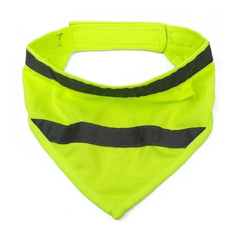 Yellow and orange reflective striped dog bandana with adhesive strap, shown on a dog's neck.