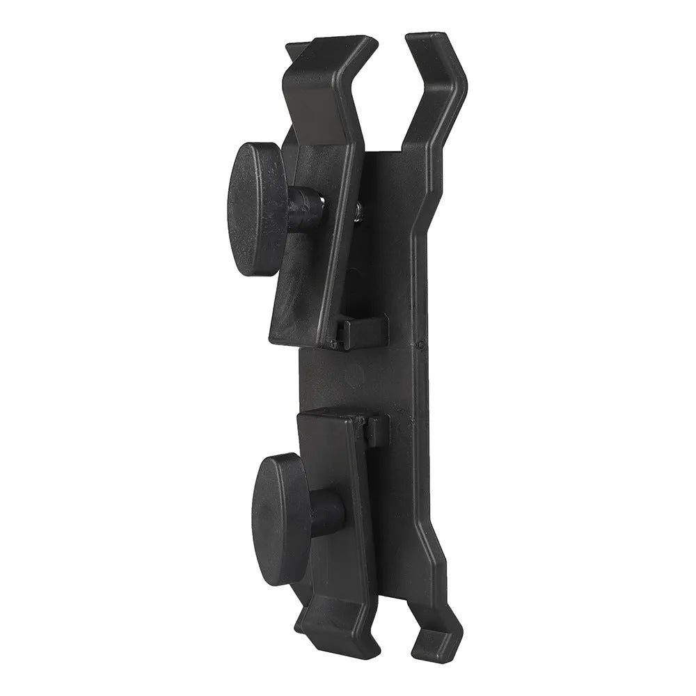 Black ABS plastic umbrella clip attached to a camera tripod shaft holding a compact umbrella.