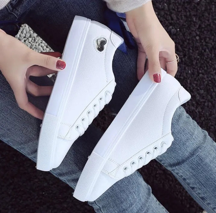 Women's PU leather heart pattern flat shoes in white red colour with non-slip rubber sole