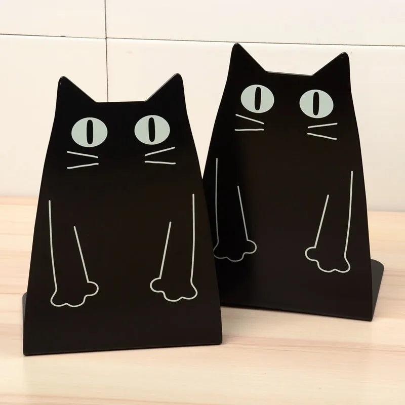 Pair of iron bookends in blue colour on a shelf holding books upright