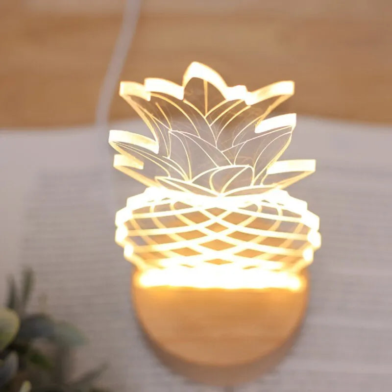Cartoon pineapple-shaped USB table lamp with wooden base on a bedside table.