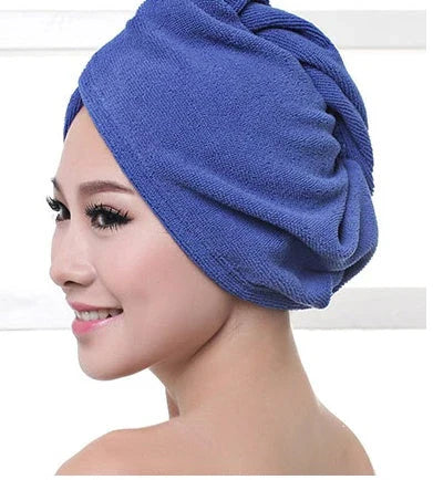 Absorbent microfiber hair turban in various vibrant colours, designed for fast and convenient drying