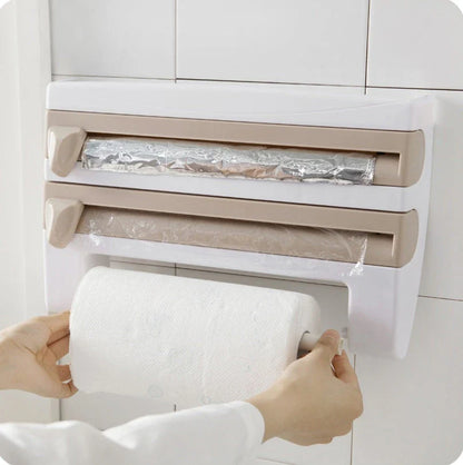 Versatile wall-mounted kitchen storage dispenser with cling film, foil, and paper towel cutting tools