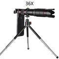 Black 36x telephoto mobile phone telescope with universal clip and carrying pouch on a table.