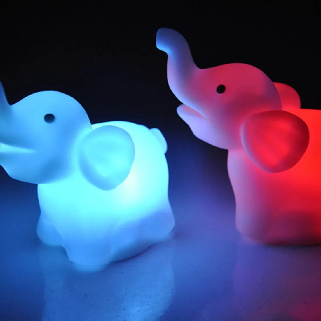 Elephant night light with 7 colour changing slow flashing modes, vinyl body, size 8x8.8x4.5cm, battery powered