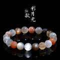 Natural colourful moonlight moonstone duobao bracelet with 8mm beads on a wrist.