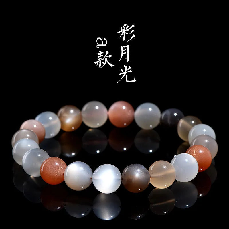 Natural colourful moonlight moonstone duobao bracelet with 8mm beads on a wrist.