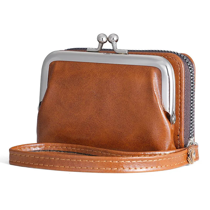 Ladies' small black buckle coin purse with a clip closure, shown closed, measuring 4 inches.