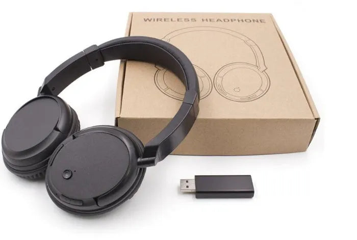 Black stereo wireless headset with USB FM transmitter and 3.5mm audio cable for dual wireless/wired operation