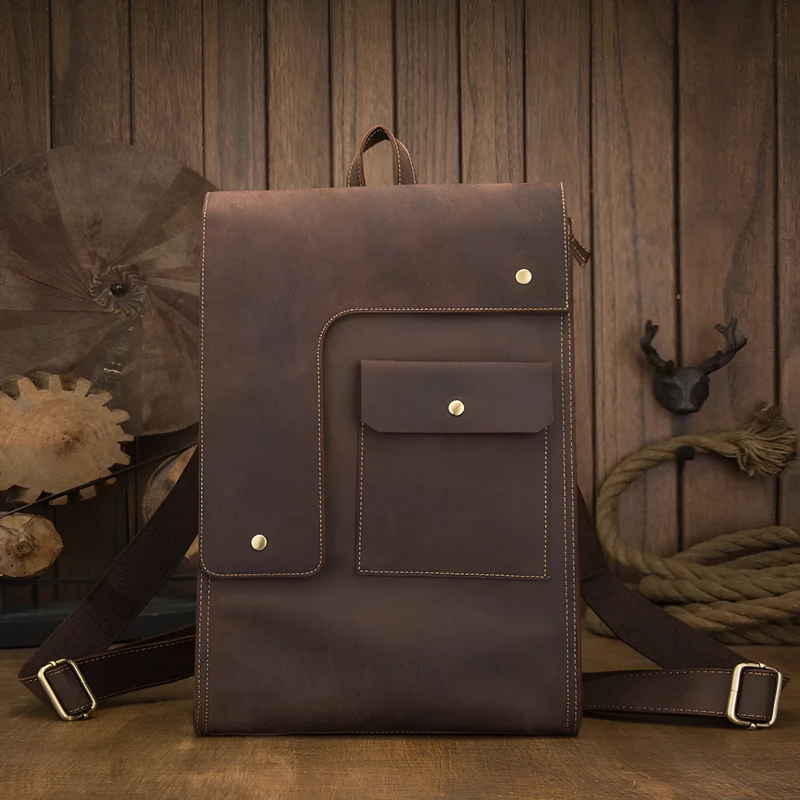 Dark brown genuine leather men's travel bag with retro style, showing three-dimensional pockets and shoulder straps.