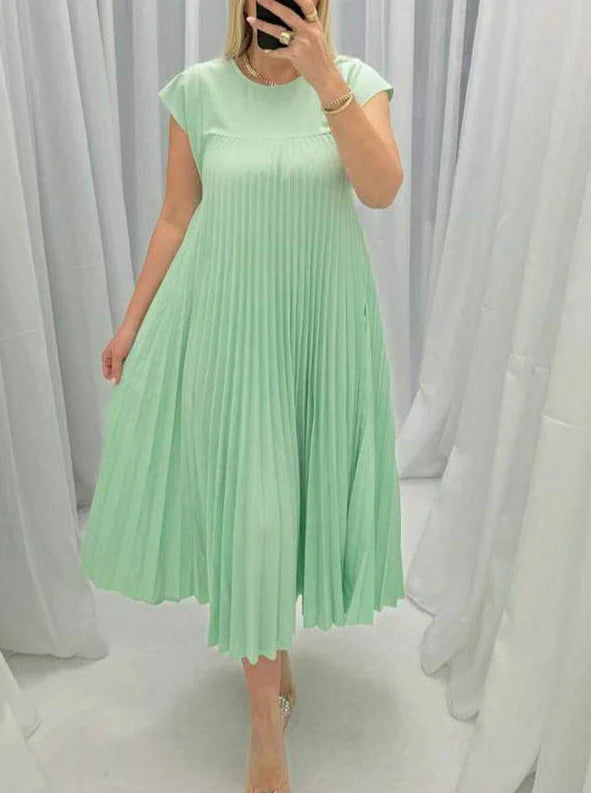 Women's summer pleated long dress in various colours, showcasing the unique design and flattering silhouette.