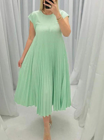 Women's summer pleated long dress in various colours, showcasing the unique design and flattering silhouette.