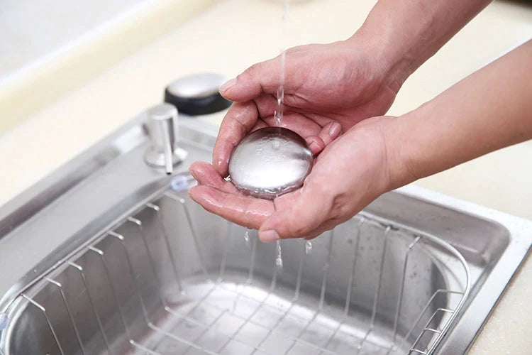 Oval stainless steel soap for removing kitchen odors from hands