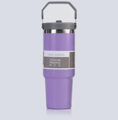 Insulated stainless steel travel tumbler with double-wall vacuum technology, sweat-proof powder coating, and BPA-free sliding lid for hot and cold drinks on the go.