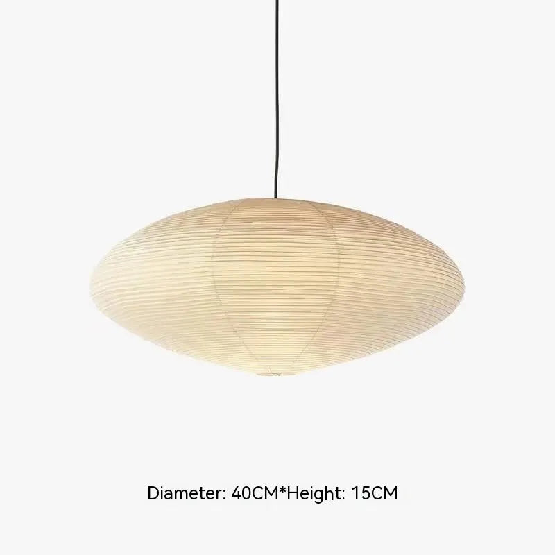 Modern paper pendant ceiling lamp with three colour light source shown in a living room setting