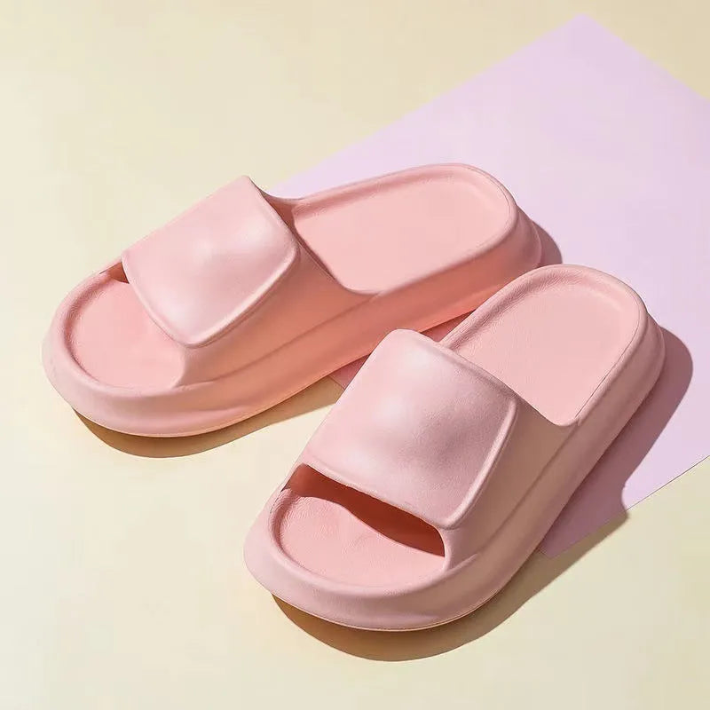 A pair of thick-soled EVA flip-flop slippers for men and women in a choice of seven colours.
