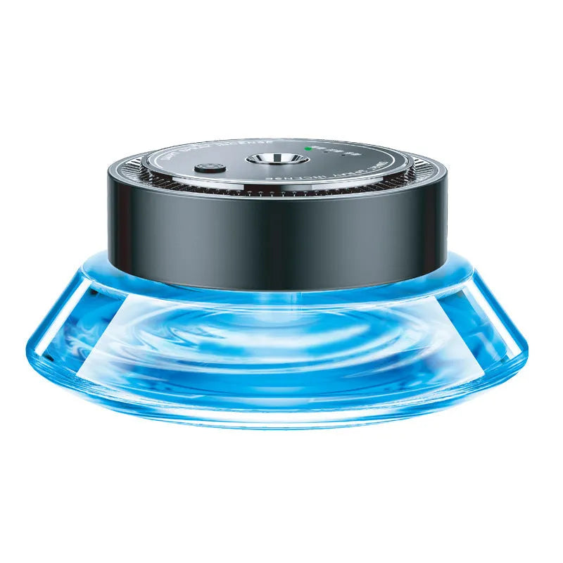 Black smart automatic spray car air freshener device with a 50 ml refill cartridge mounted on a car vent.