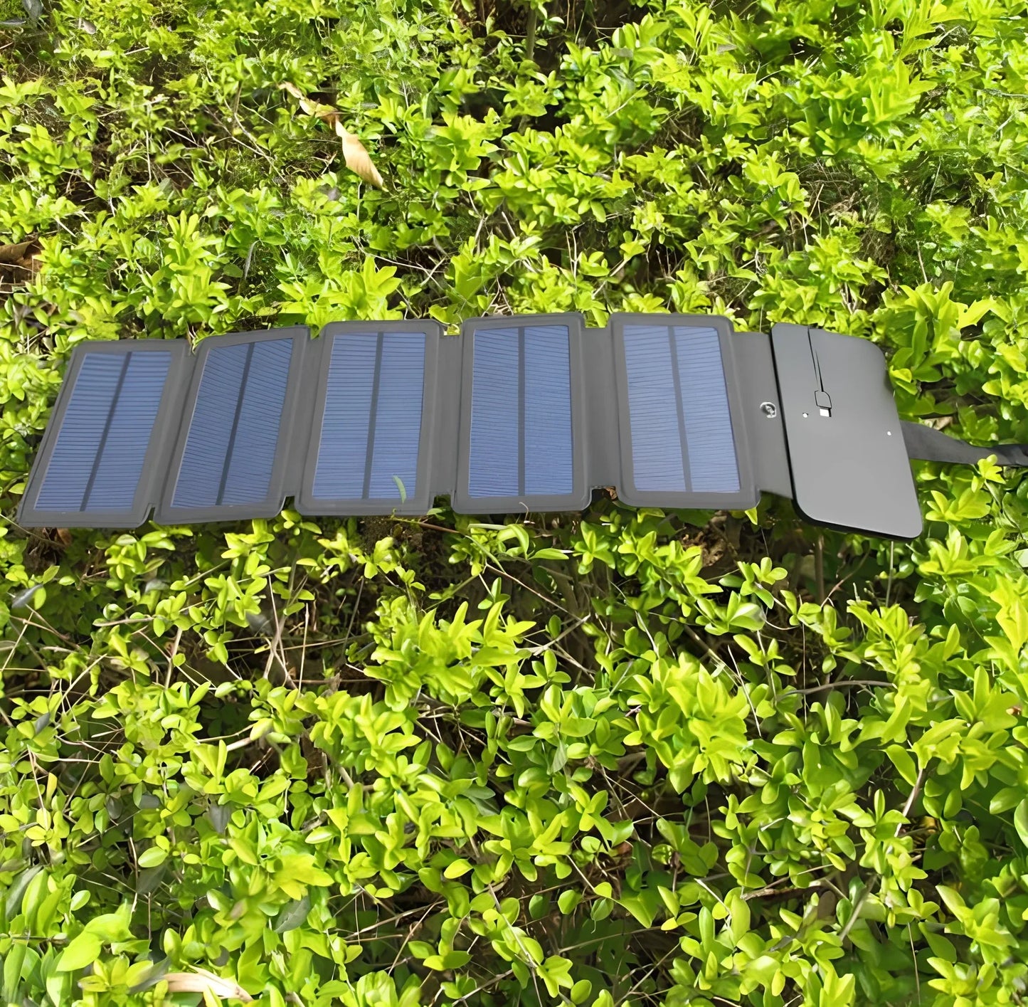 8W folding solar charger with expanded monocrystalline panel showing USB output port