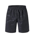 Men's reflective basketball shorts in camouflage and stripes pattern, black colour, polyester fibre